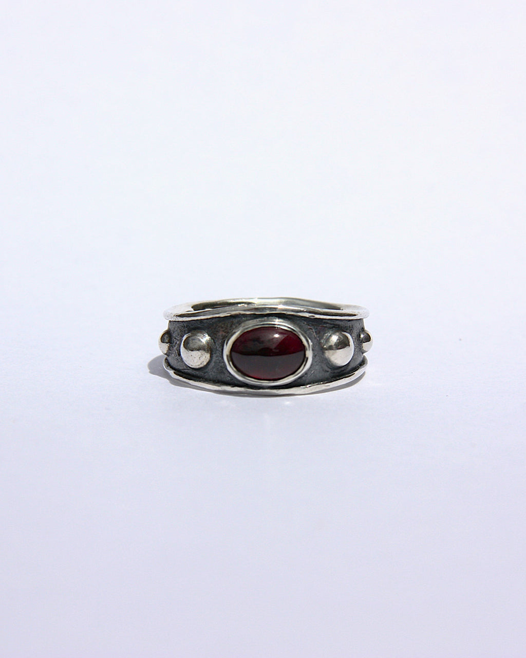 Reed Ring Garnet J 1/2