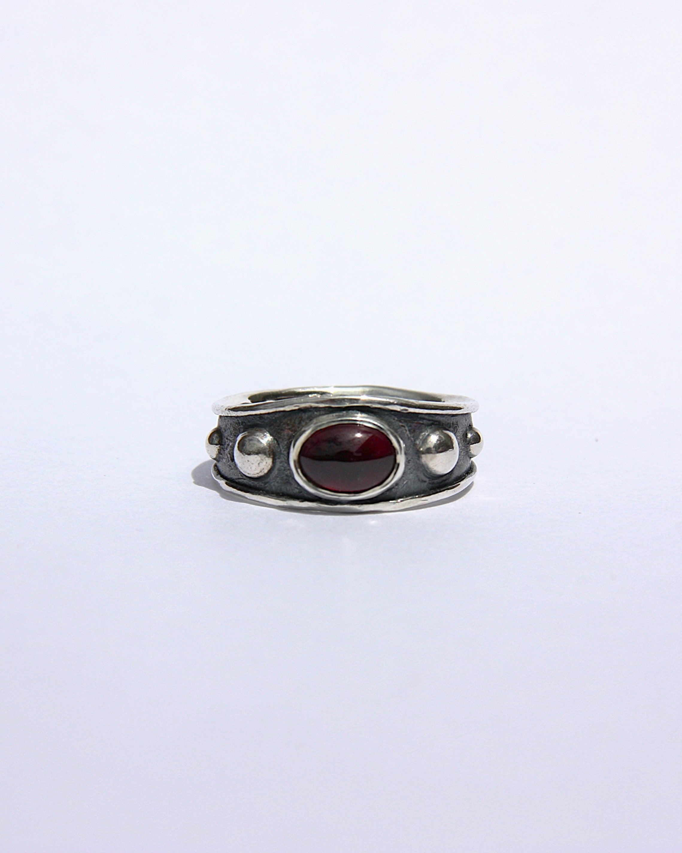 Reed Ring Garnet J 1/2