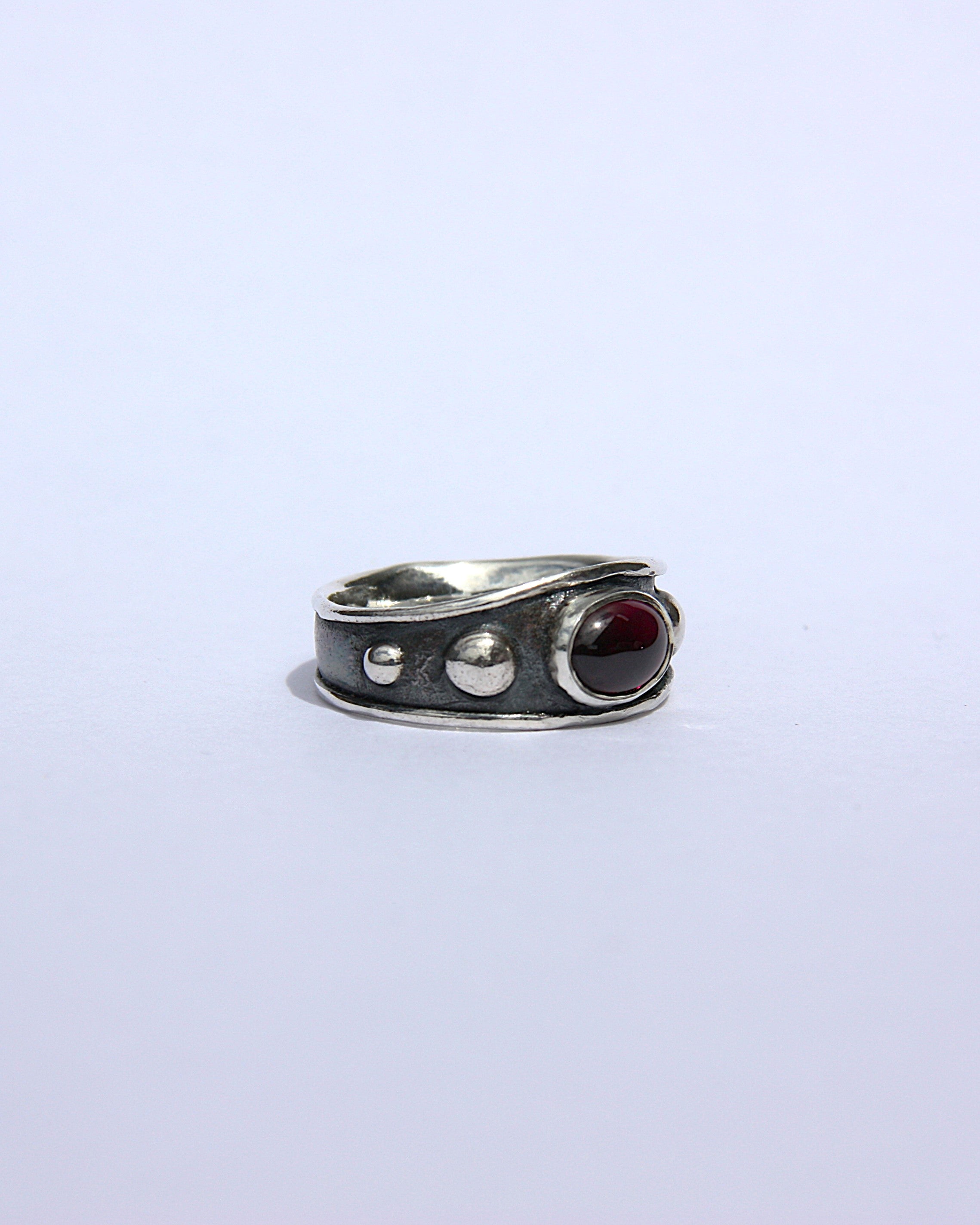 Reed Ring Garnet J 1/2