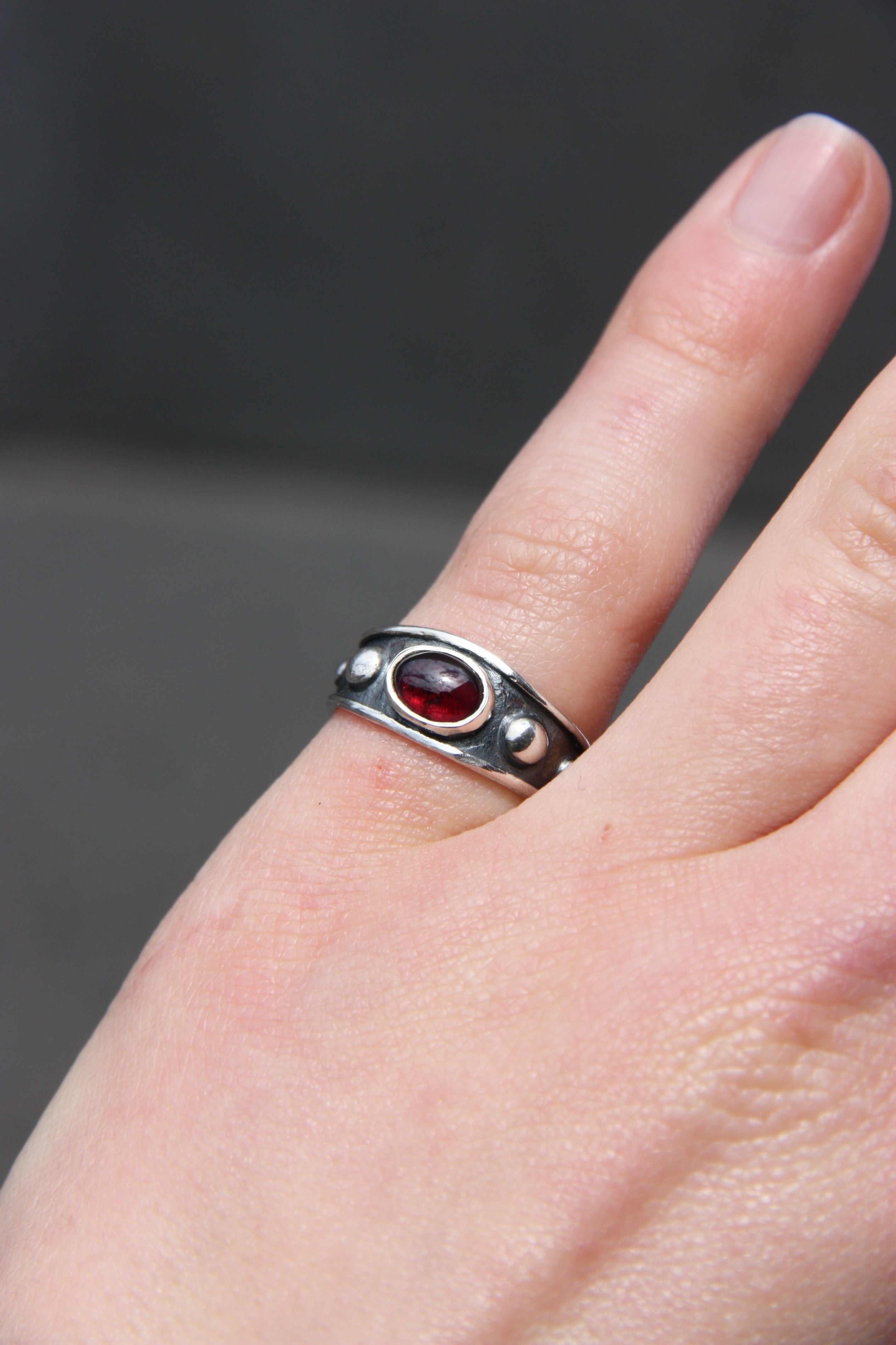 Reed Ring Garnet J 1/2